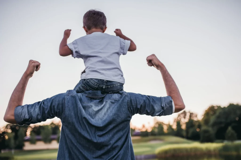 fathers day note from Jim Daly. little boy riding on his dad's shoulders