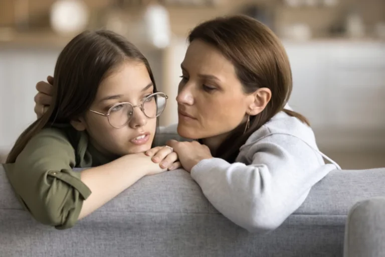 Mom talking with concerned teen